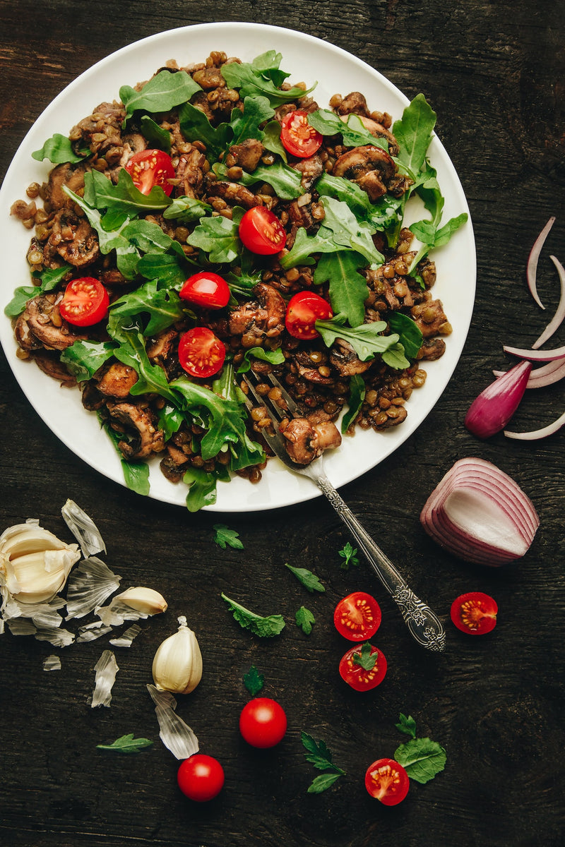 Lentils with mushrooms and rocket salad