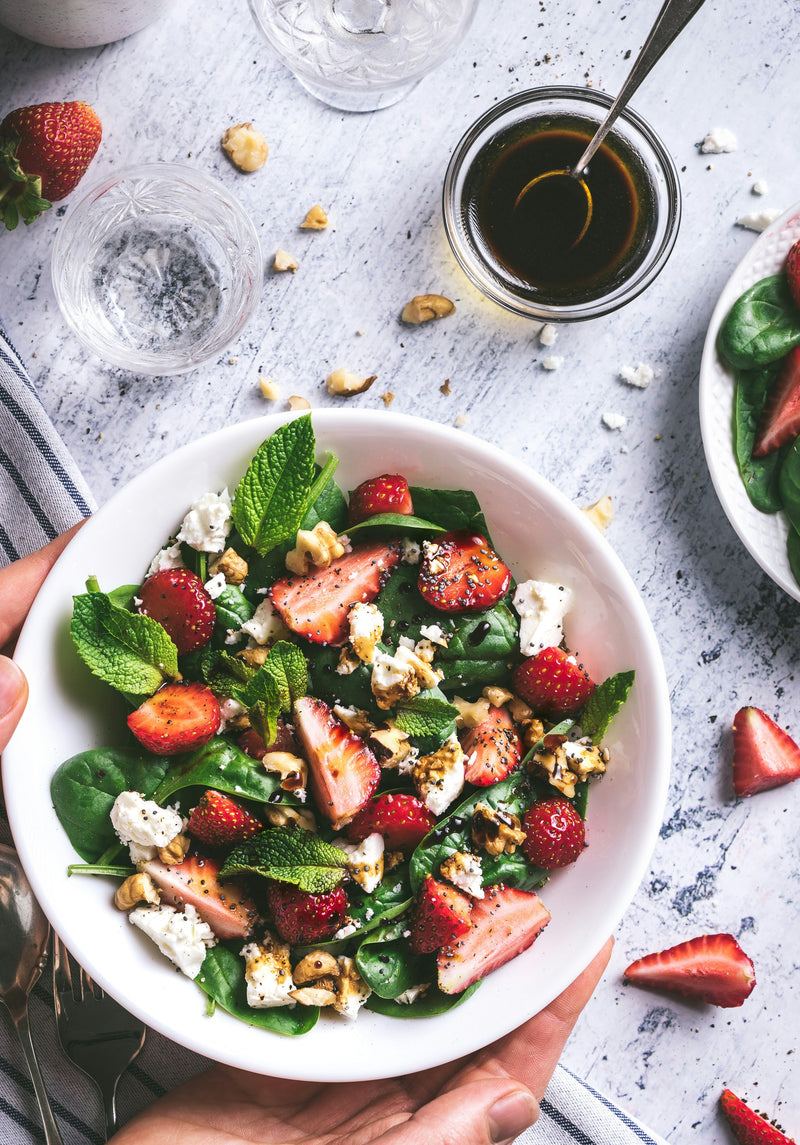 Spinach strawberry salad with walnuts