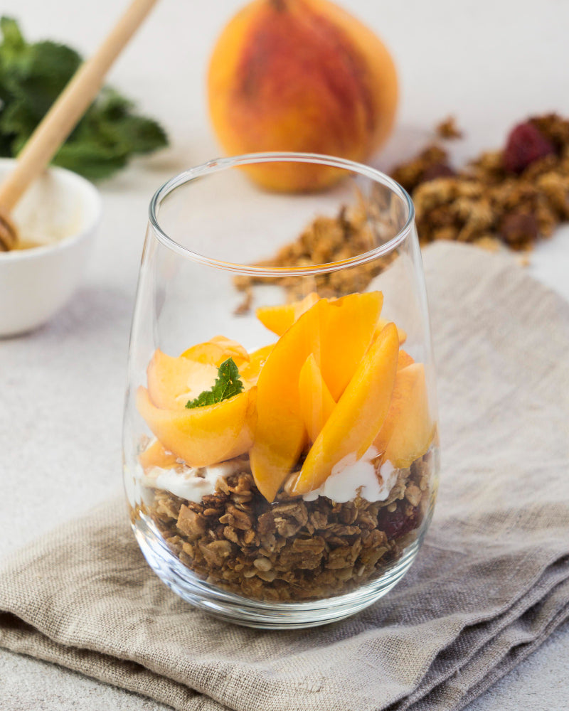 Cocoa granola peach parfait