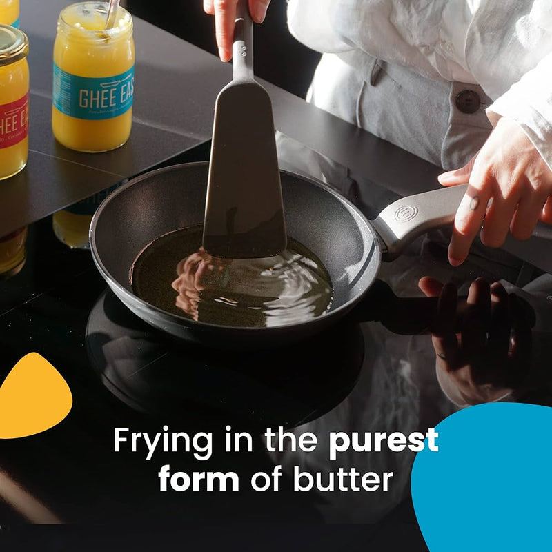 Ghee Easy in use while frying vegetables in a pan