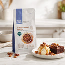 Salted Caramel Nut Mix pouch - dessert lifestyle with vanilla ice cream, caramel drizzle and brownie