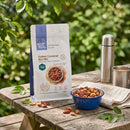 Salted Caramel Nut Mix pouch - outdoor garden picnic lifestyle with enamel bowl and coffee flask
