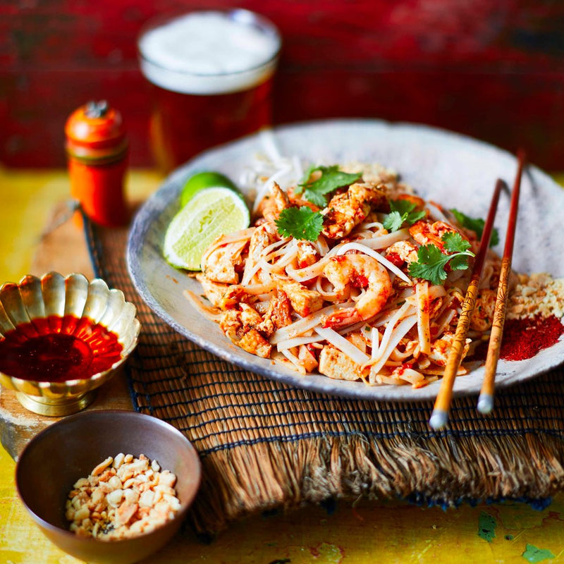 Thai Kra Pao stir-fry served with jasmine rice and fresh basil
