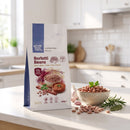 Borlotti Beans 500g pouch on a kitchen counter with cooked and dried beans